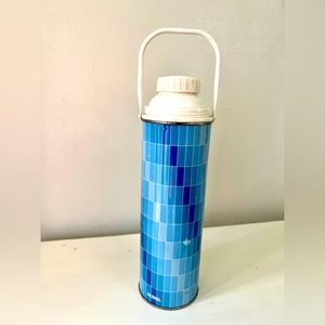 Vintage 1970s blue blue thermos.